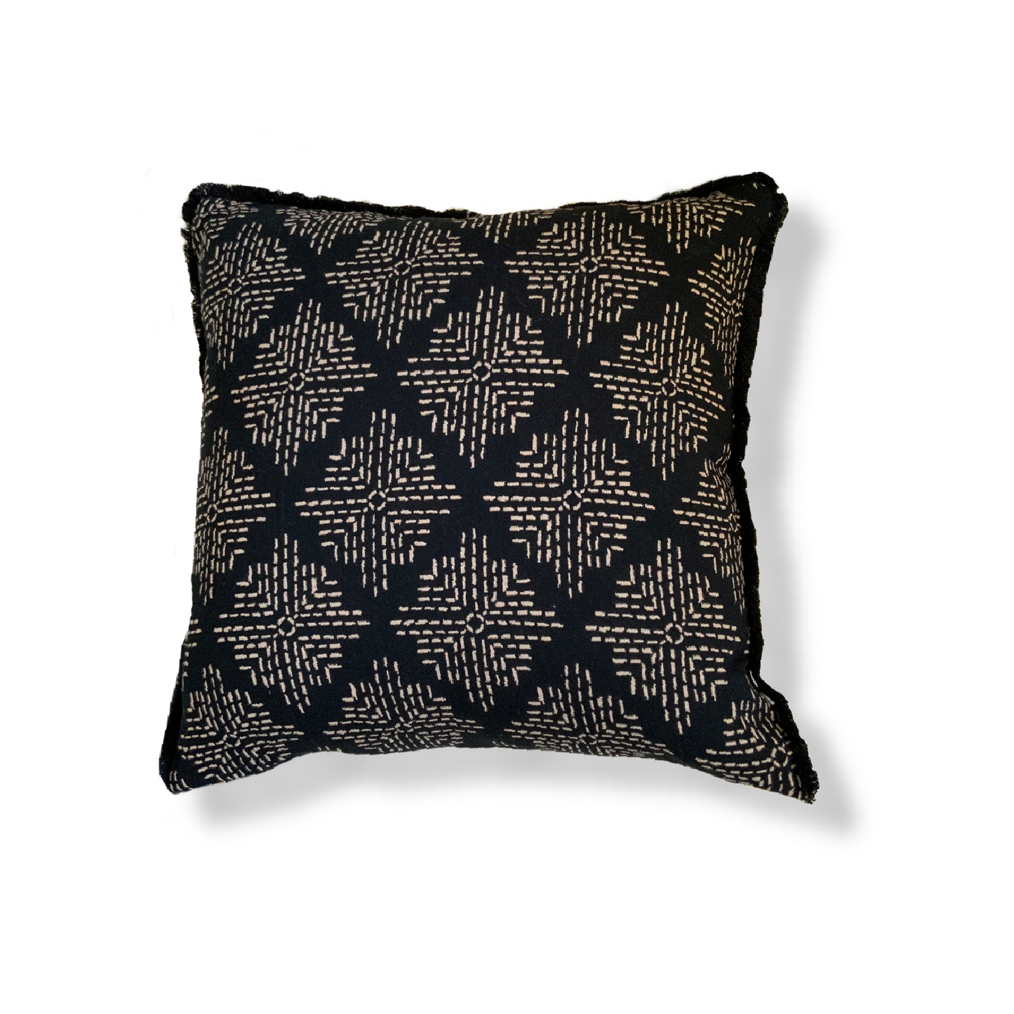 The Mila cushion is a luxurious addition to any living space, featuring a large feather-filled design with a cream embroidery pattern on a black background and a black fringe edging for added sophistication. With dimensions measuring 50cm x 50cm, this cushion is sure to make a statement in your home and perfect cushion for your bed or sofa. Available as a filled cushion.