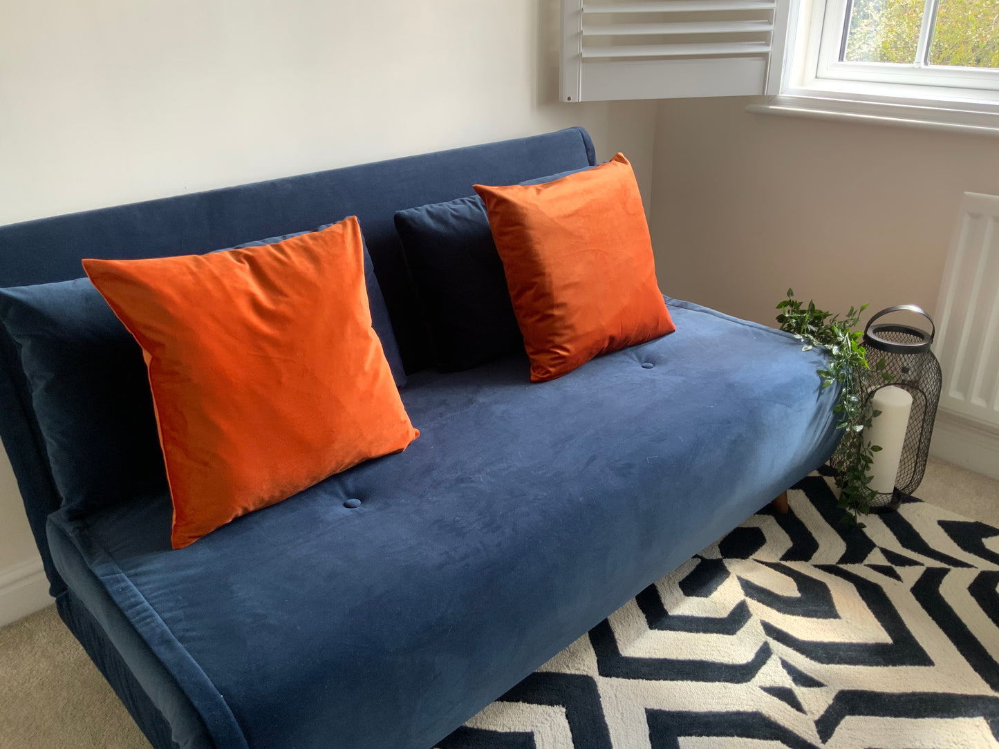 This vibrant Rust/deep orange velvet cushion adds a touch of colour to any room. The pillow can be displayed as a stand alone cushion or combined with other cushion in our range such as ‘Cream Faux Fur’ cushion or the ‘Tufted Geo Pattern’ cushion. Please note, colour can vary slightly from image dependent on lighting. The pillow is 45cm x 45cm, with a hidden zipper design. Our wash recommended action is dry clean only.