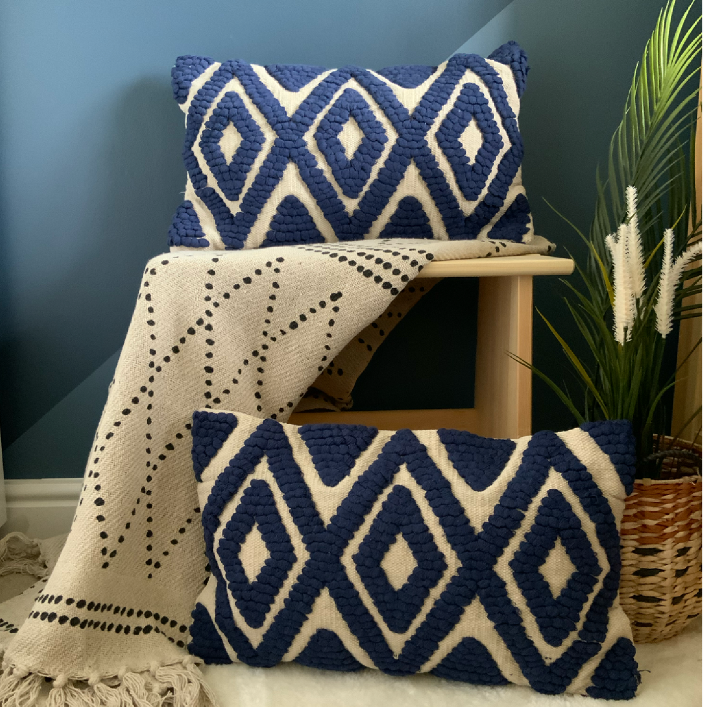 The Navy Blue Kiera cushion is a cotton, hand tufted, woven cushion. Exclusively designed by Cultured Home founder Pratisha. This statement pillow has a striking navy tufted, diamond pattern, against a woven beige background, making it the perfect accessory to add a little flair to any bed, sofa or space. This is a highly quality, rustic cushion and dry clean only. All cushions are handmade and can vary slightly in pattern and size from the images shown.